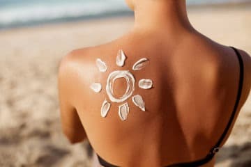 Girl getting a suntan on the beach